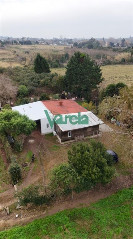 Venta terreno grande con mejoras barros blancos 5 casas