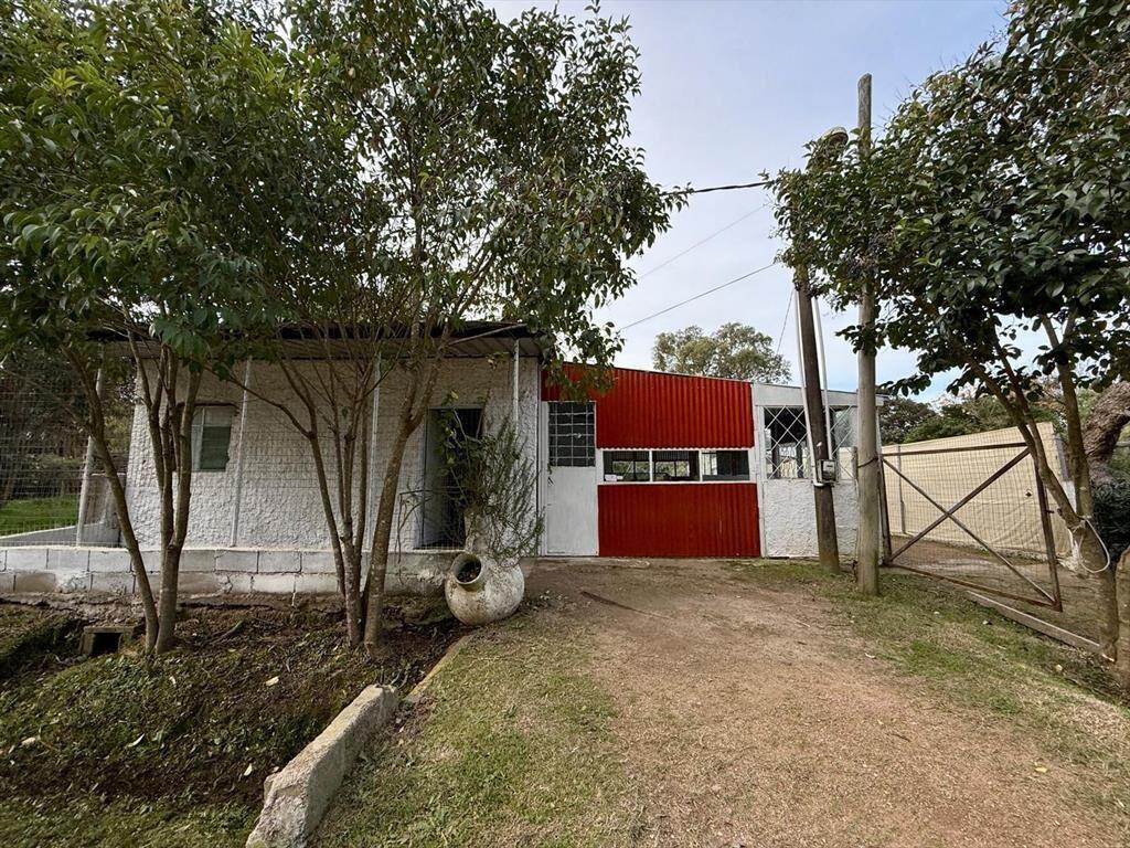 Venta Terreno con construcción Santa Ana