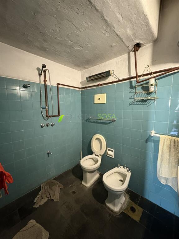 CASA Y 2 LOCALES EN RIO NEGRO ESQ. CERRO LARGO
