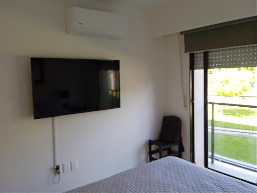 Impecable apartamento 1 dormitorio con terraza y garaje.