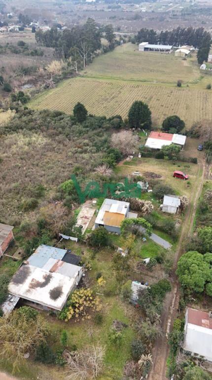 Venta terreno grande con mejoras barros blancos 5 casas