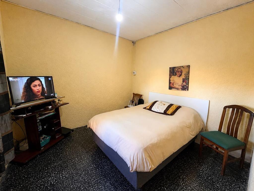 CASA EN VENTA CON AMPLIO TERRENO Y GALPON