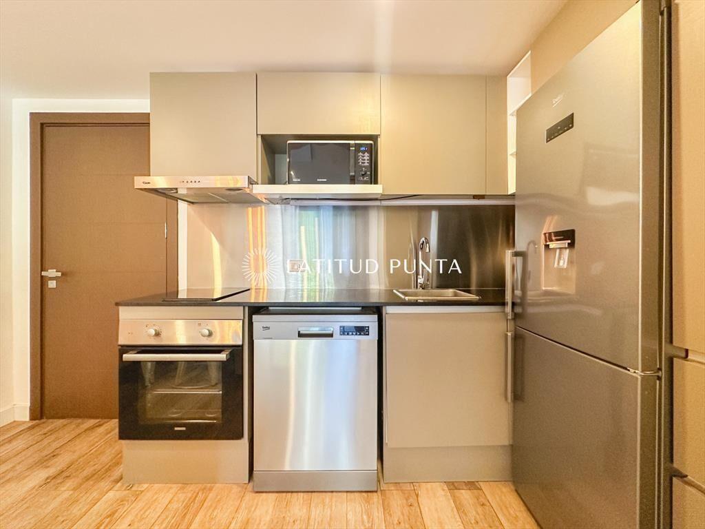 Apartamento 1 dormitorio con jardín. Puerto