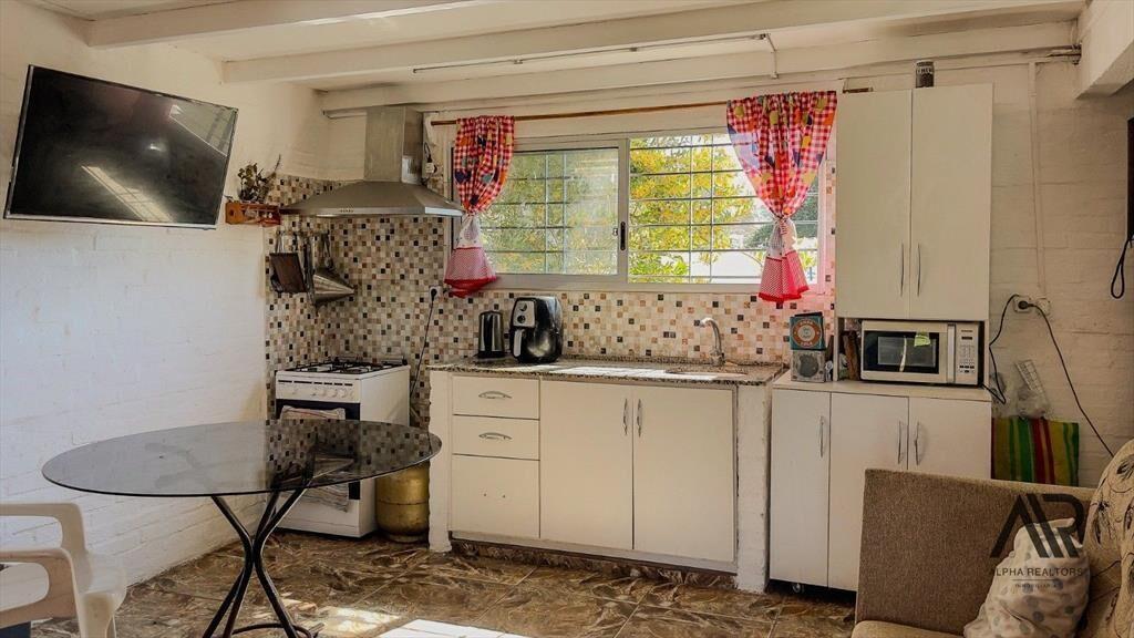 Venta Terreno mas 3 propiedades c/ cochera en Bello Hori...