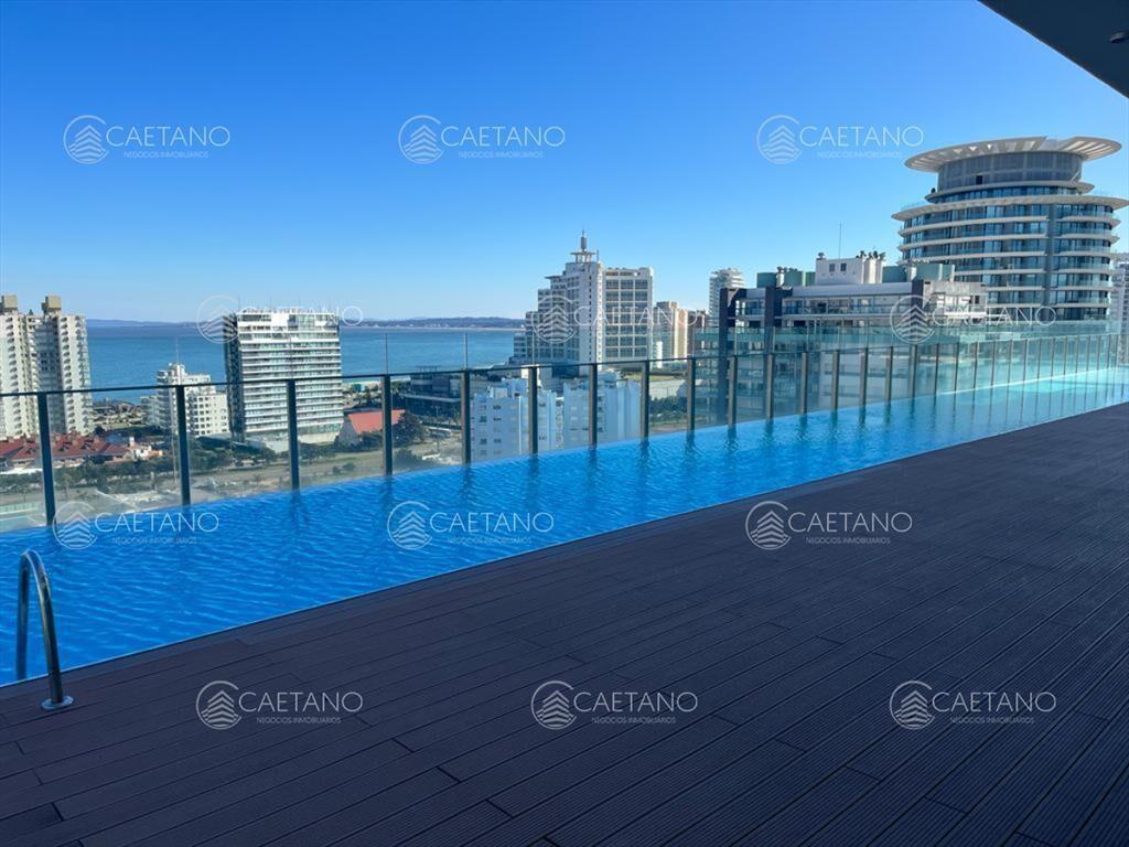 Un dormitorio y medio con hermosa vista a Playa