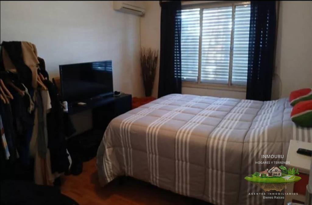Venta de casa familiar 3 dormitorios ,portal mas garaje ubi