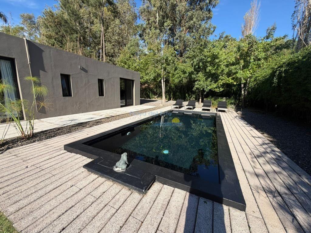 Confortable casa en Barrio Privado