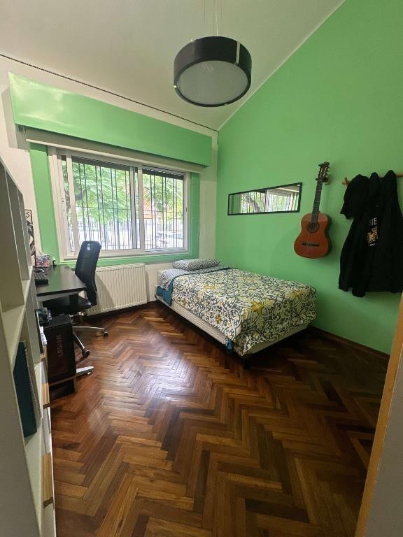 VENTA SÓLIDA PROPIEDAD CON FONDO Y GARAJE