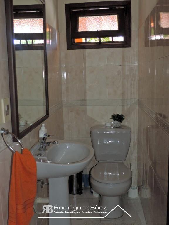VENTA CASA GEMELA 3 DORMITORIOS 2 BAÑOS GARAJE FONDO VERDE