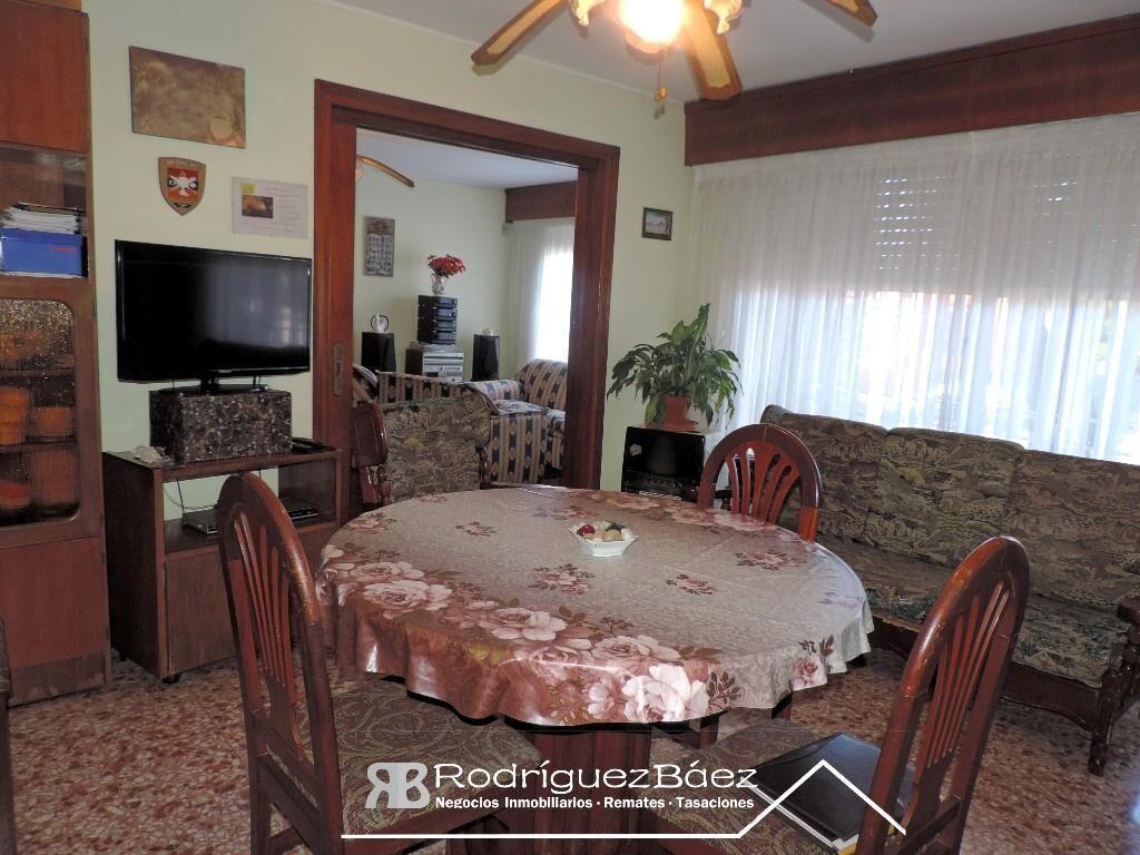 VENTA CASA 3 DORMITORIOS 2 BAÑOS FONDO VERDE GARAGE JARDIN
