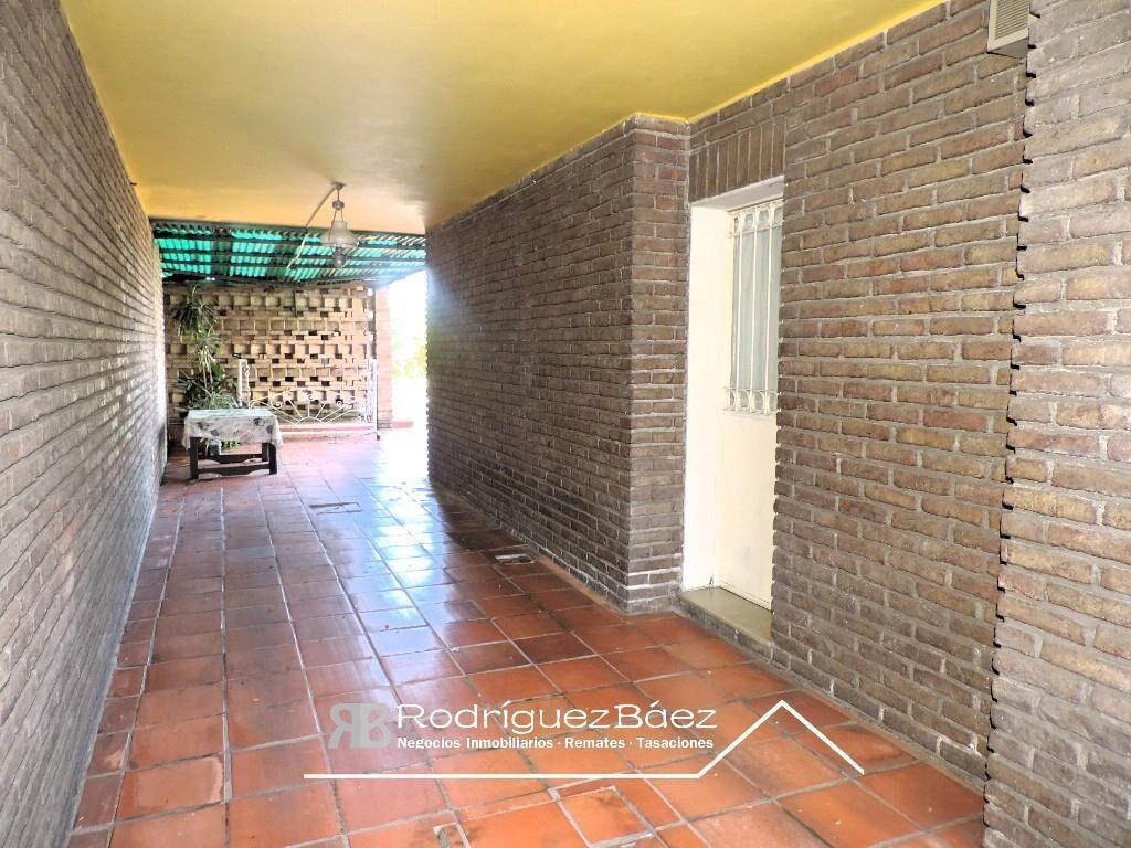 VENTA CASA 3 DORMITORIOS 2 BAÑOS FONDO VERDE GARAGE JARDIN