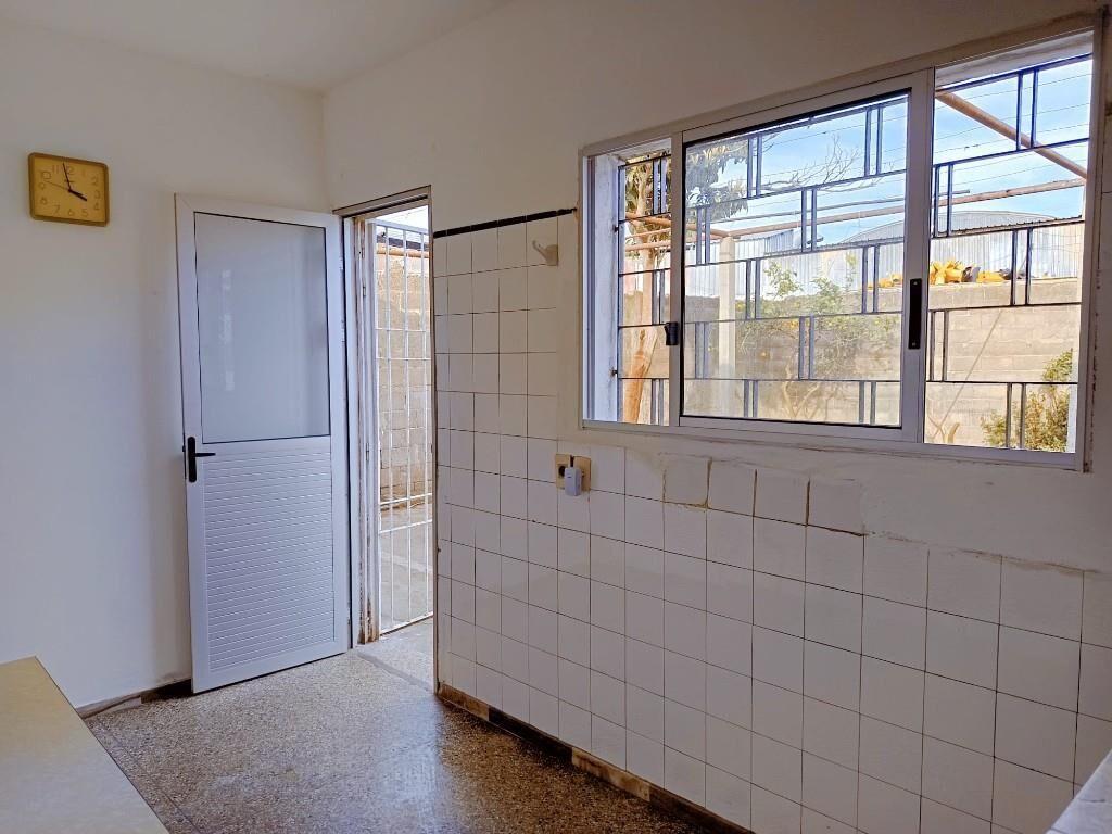 Casa de 2 dormitorios en Malvín Norte con jardín al frente,