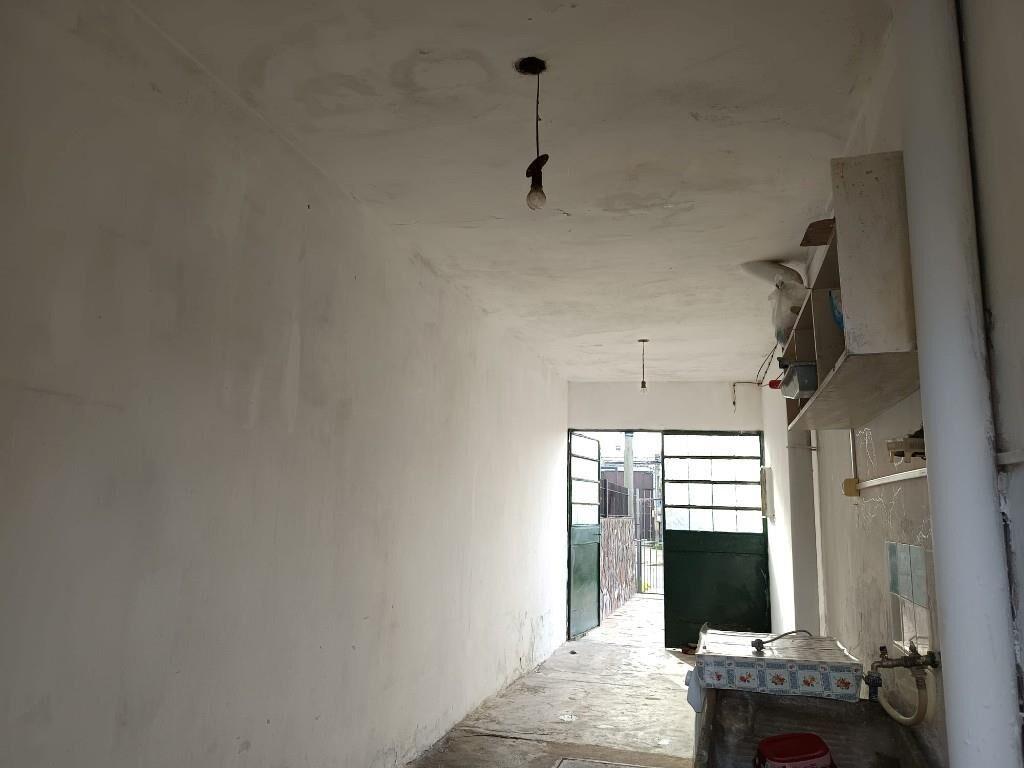 Casa de 2 dormitorios en Malvín Norte con jardín al frente,