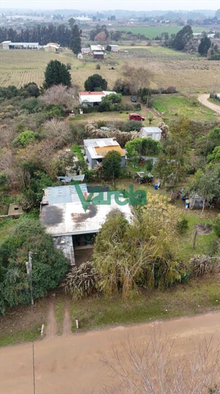 Venta terreno grande con mejoras barros blancos 5 casas