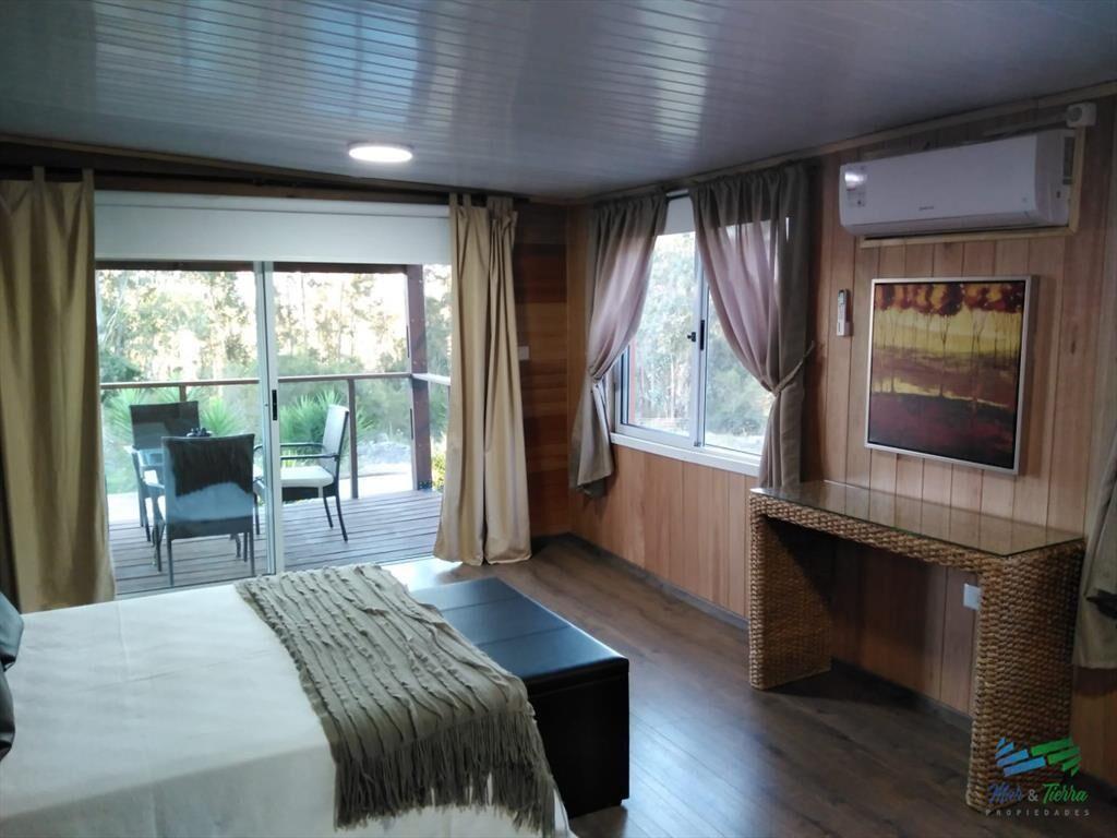 Muy linda chacra con casa, arbolada y bien