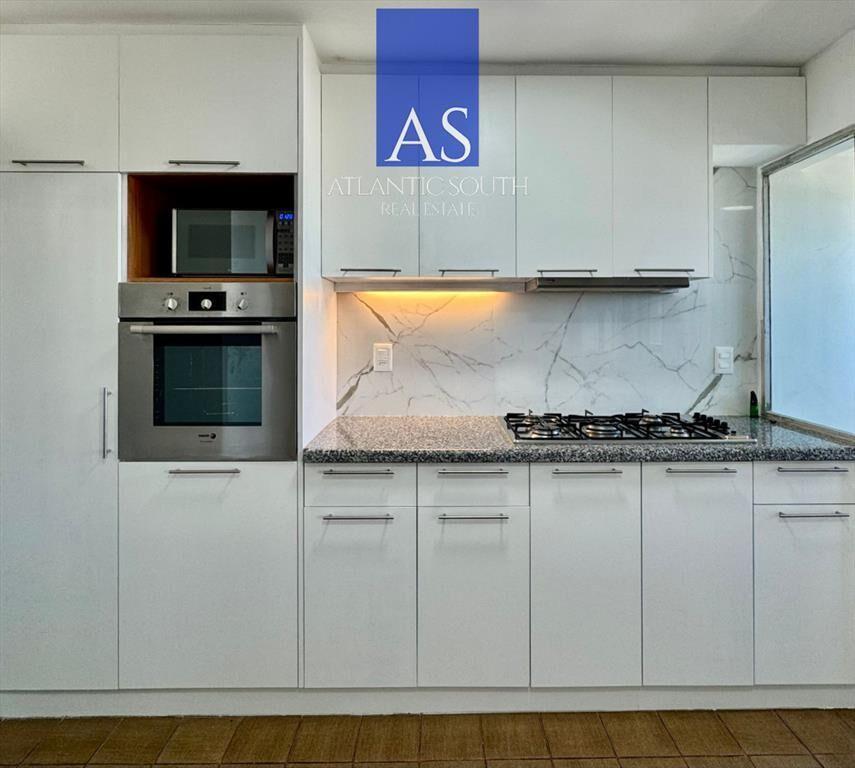 Apartamento de 4 dormitorios en península con al