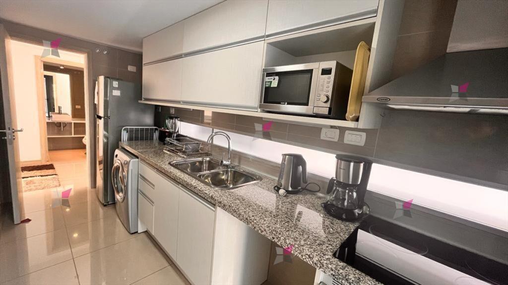 VENTA APARTAMENTO 2 DORMITORIOS 2 BAÑOS EDIFICIO