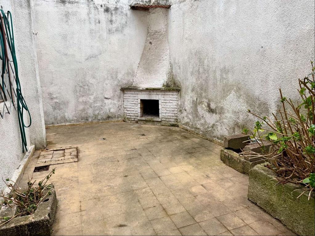 Venta casa 2 dormitorios más servicio, escritorio, garaje p