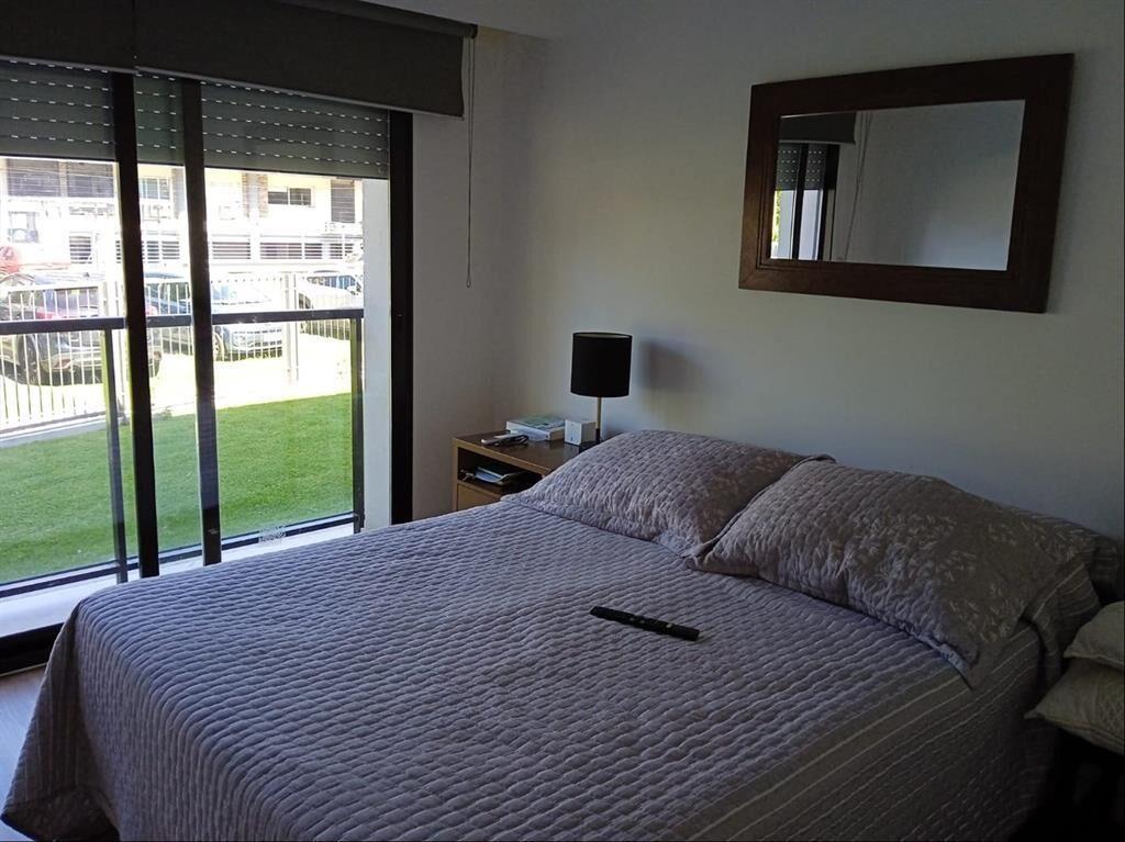 Impecable apartamento 1 dormitorio con terraza y garaje.