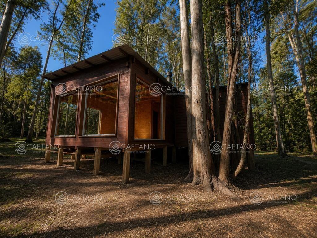 VENTA DE TERRENO CON 2 CABAÃ?AS PUNTA BALLENA-LAS