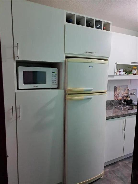 Apartamento en venta con renta , dos dormitorios con terraz