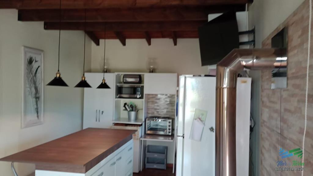 Muy linda chacra con casa, arbolada y bien