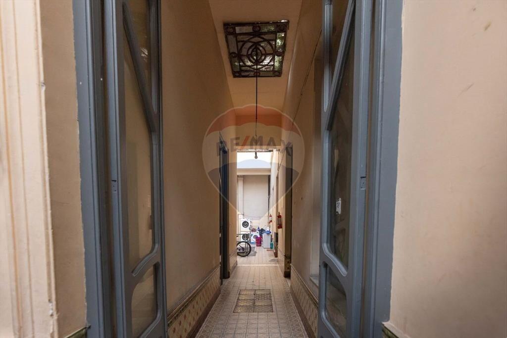 VENTA CENTRO TERRENO CON EDIFICACIONES