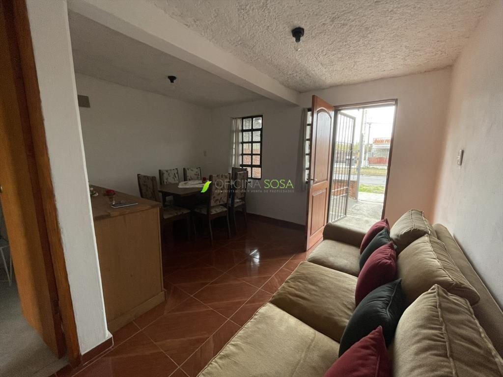 CASA EN COOPEERATIVA CON ENTRADA LATERAL DE VEHICULOS
