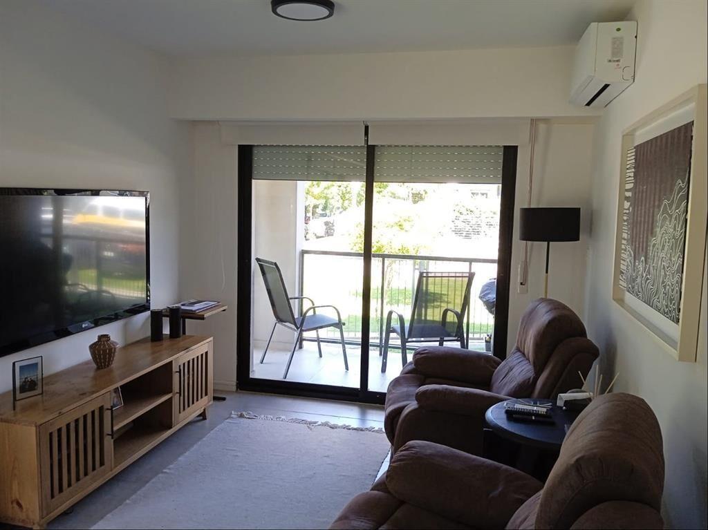 Impecable apartamento 1 dormitorio con terraza y garaje.