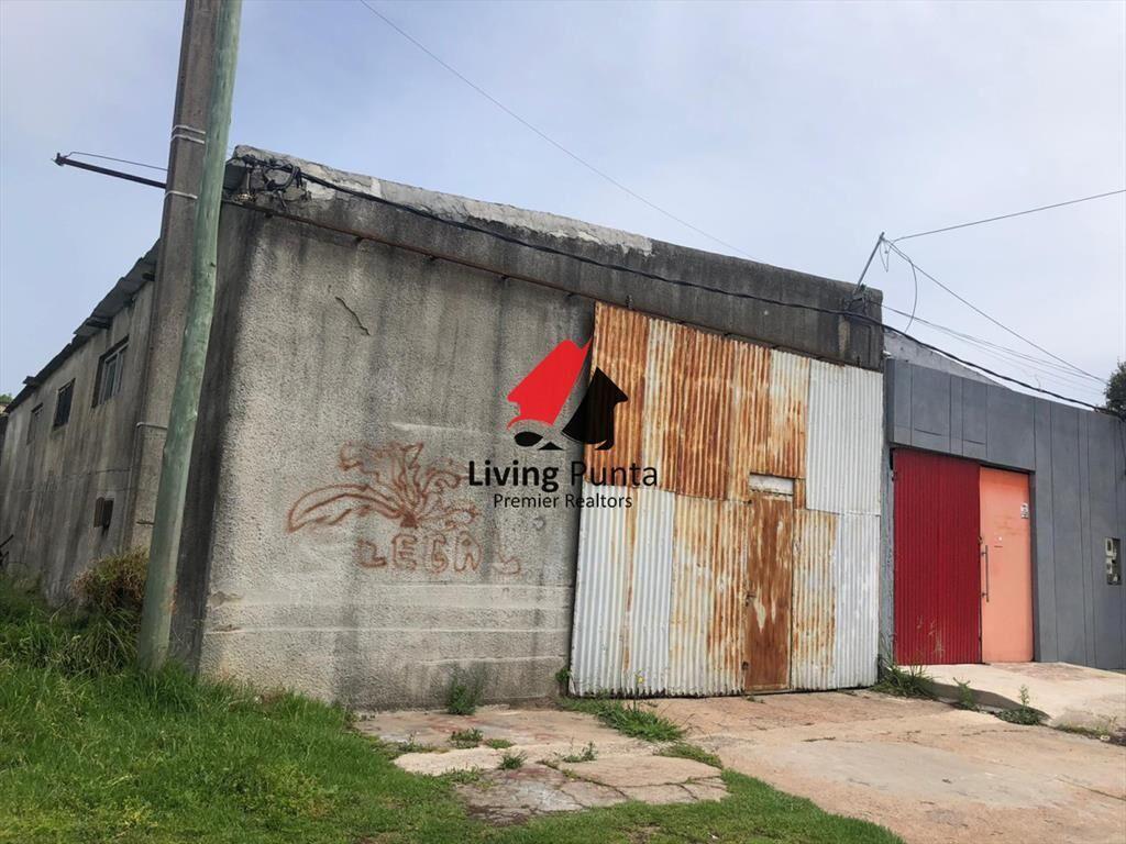Terreno con mejoras