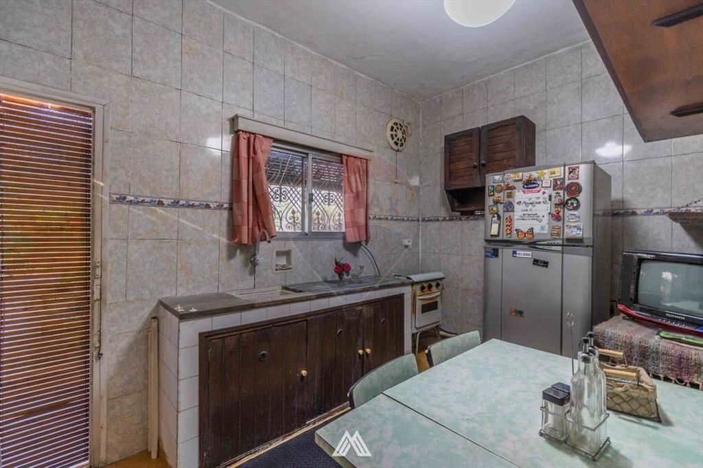 Venta de casa con 2 dormitorios y fondo en Pando