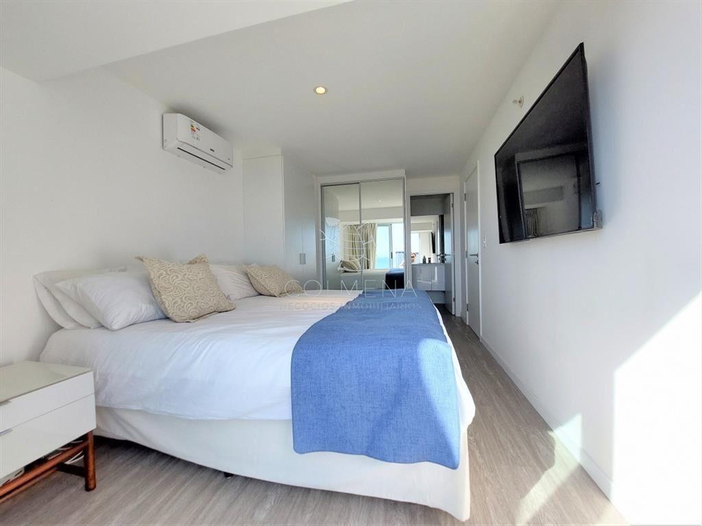 Amplio apartamento en piso alto, con excelente al