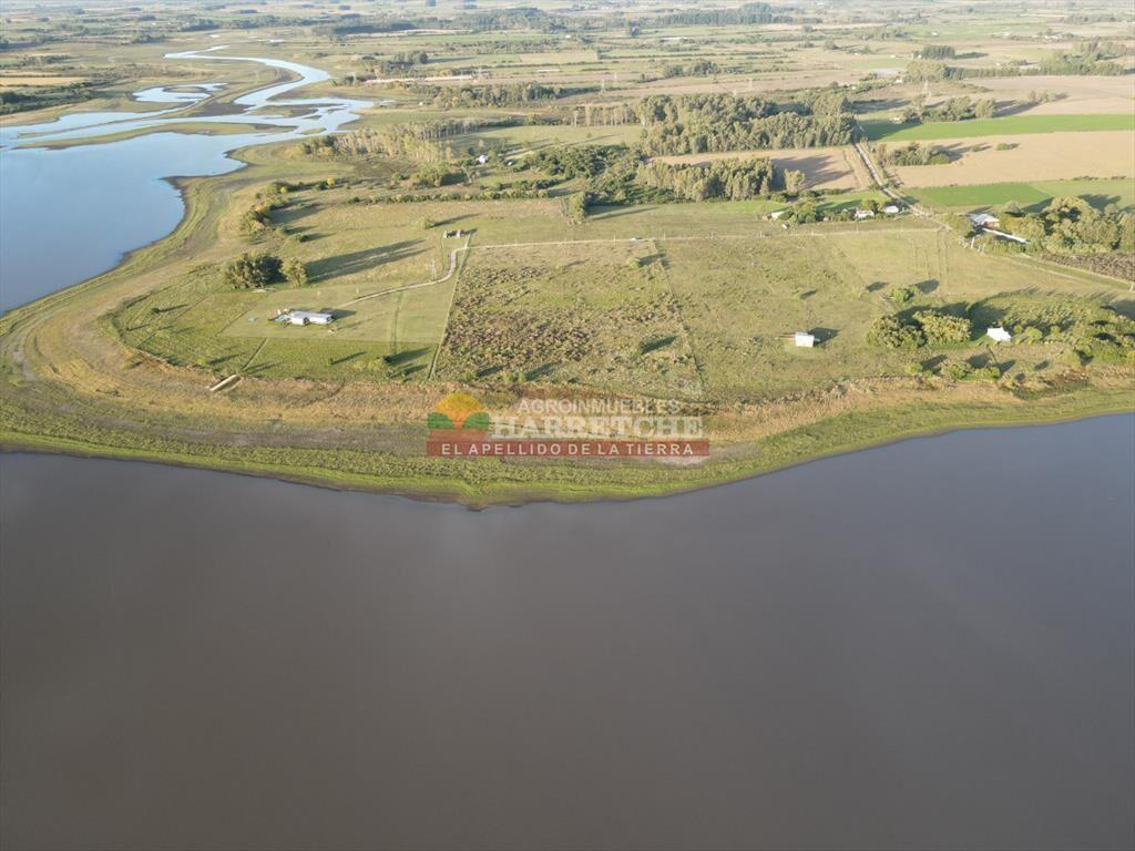 Chacra sin construcciones con la costa del Grande