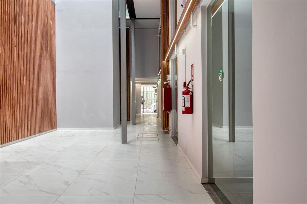 Edificio en venta, 12 apartamentos + local comercial, 1449