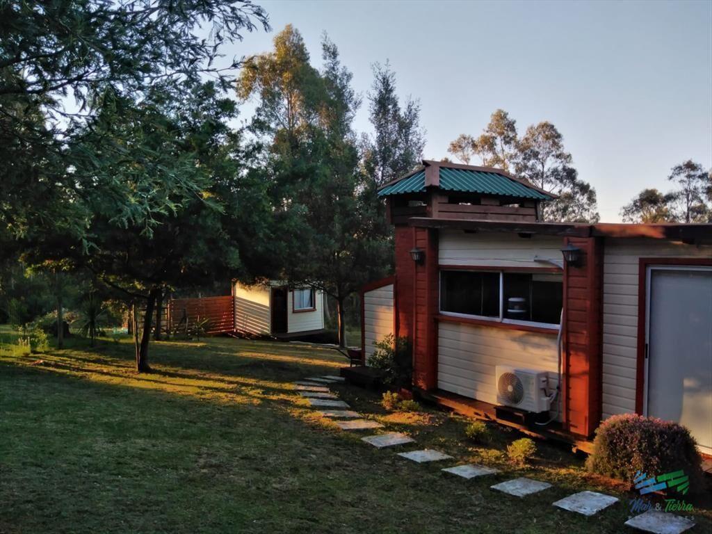 Muy linda chacra con casa, arbolada y bien