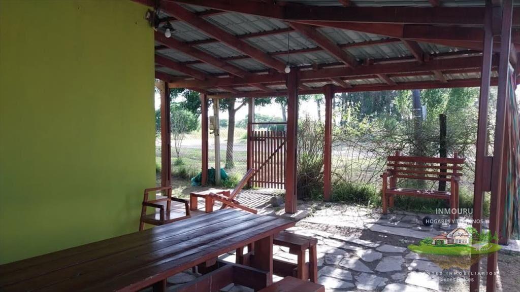 Venta de casa con terrenos en 25 de Agosto, Florida