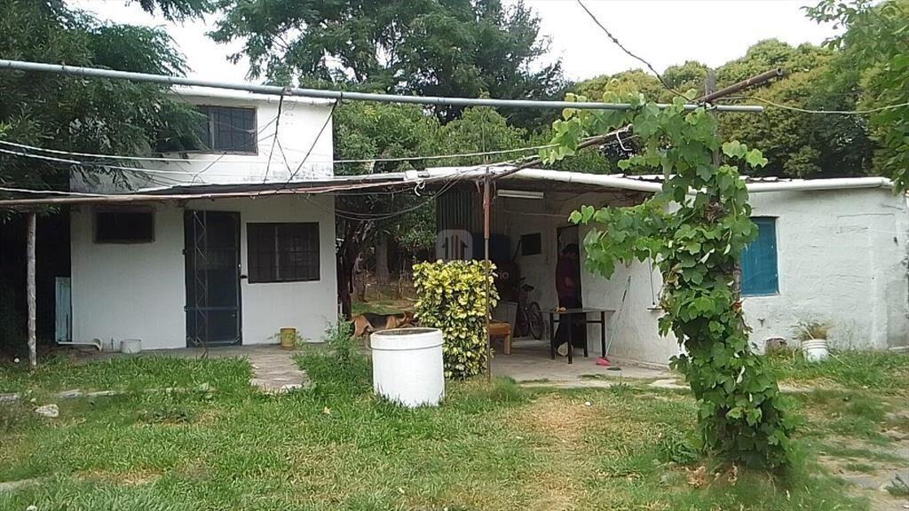 VENTA TERRENO CERRO CON 2 CASAS