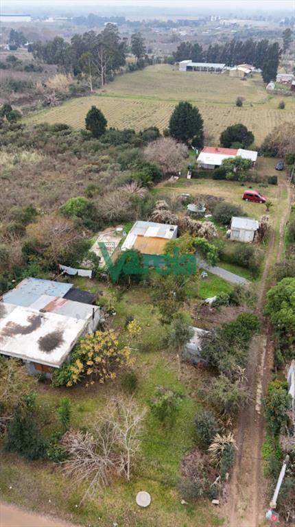 Venta terreno grande con mejoras barros blancos 5 casas