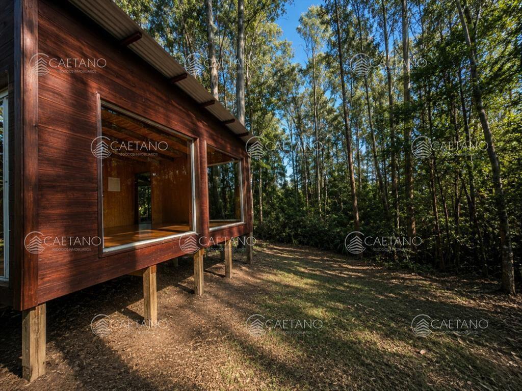 VENTA DE TERRENO CON 2 CABAÃ?AS PUNTA BALLENA-LAS