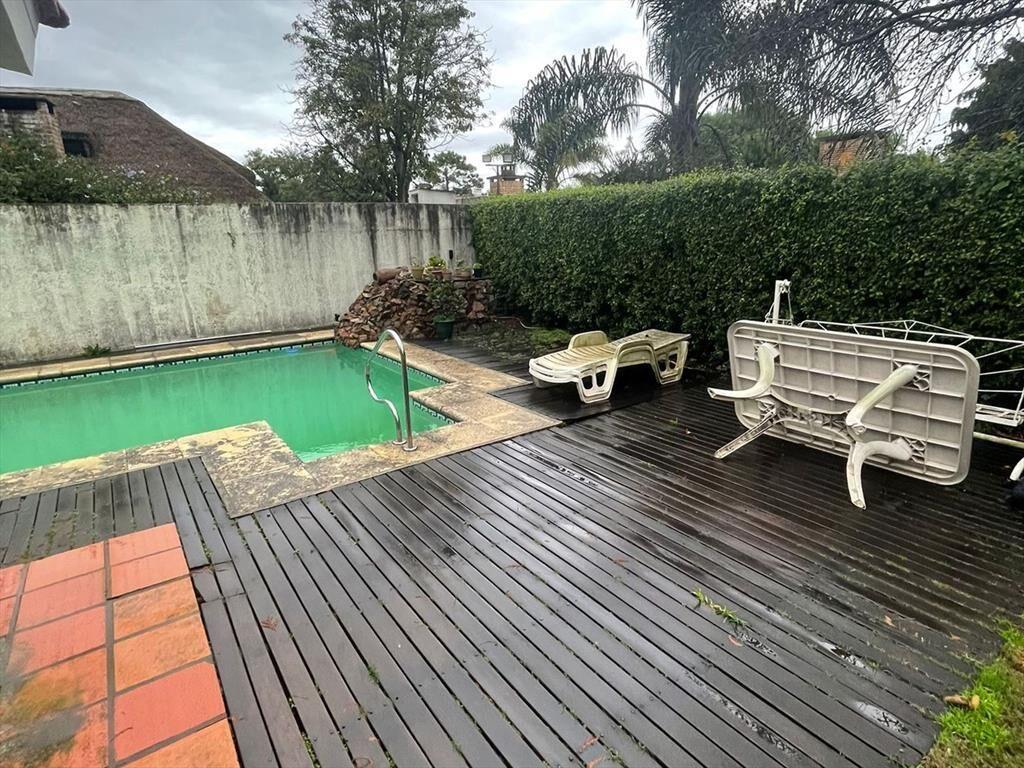 CASA EN VENTA CON RENTA ATLÁNTIDA