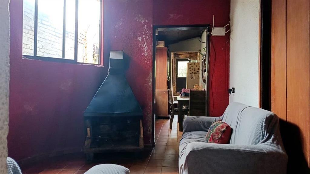 Venta de terreno con construcción en Pando