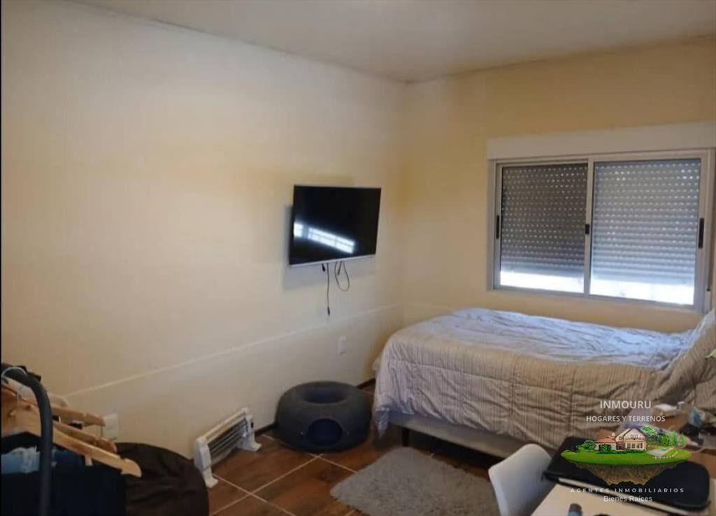 Venta de casa familiar 3 dormitorios ,portal mas garaje ubi