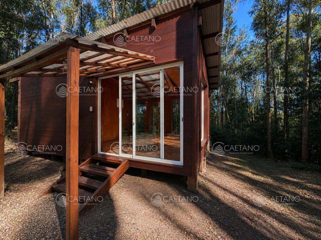 VENTA DE TERRENO CON 2 CABAÃ?AS PUNTA BALLENA-LAS