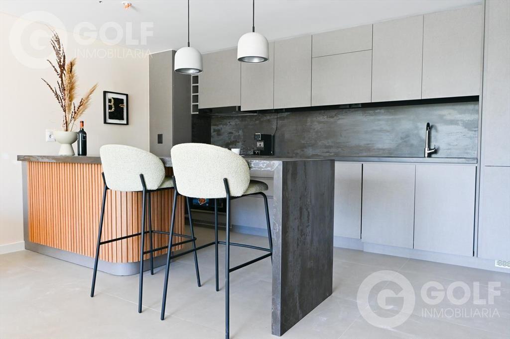 Venta de apartamento de 2 dormitorios con terraza y cochera