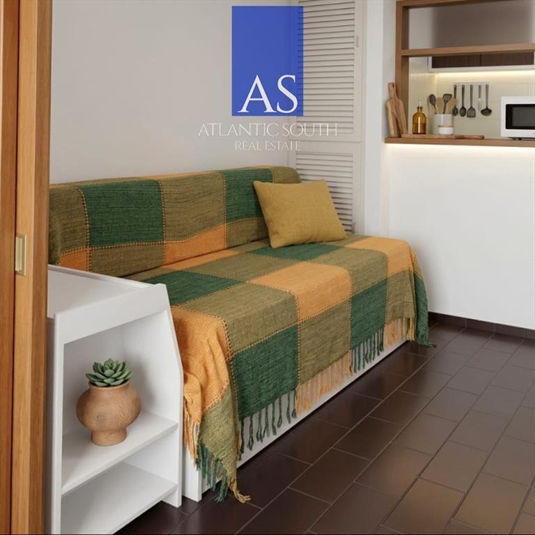 Apartamento con cochera en Península excelente