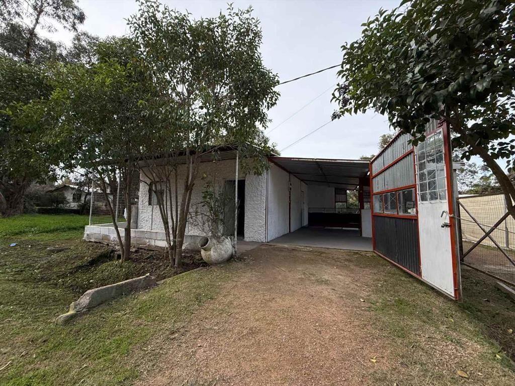 Venta Terreno con construcción Santa Ana