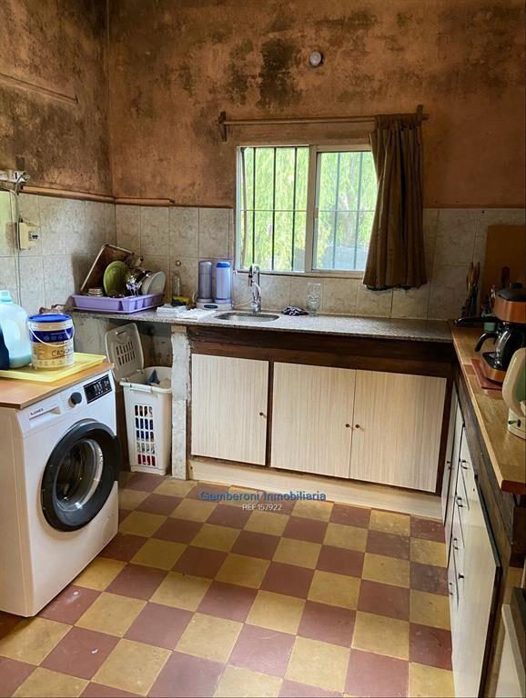 Terreno con construcciones en zona logística