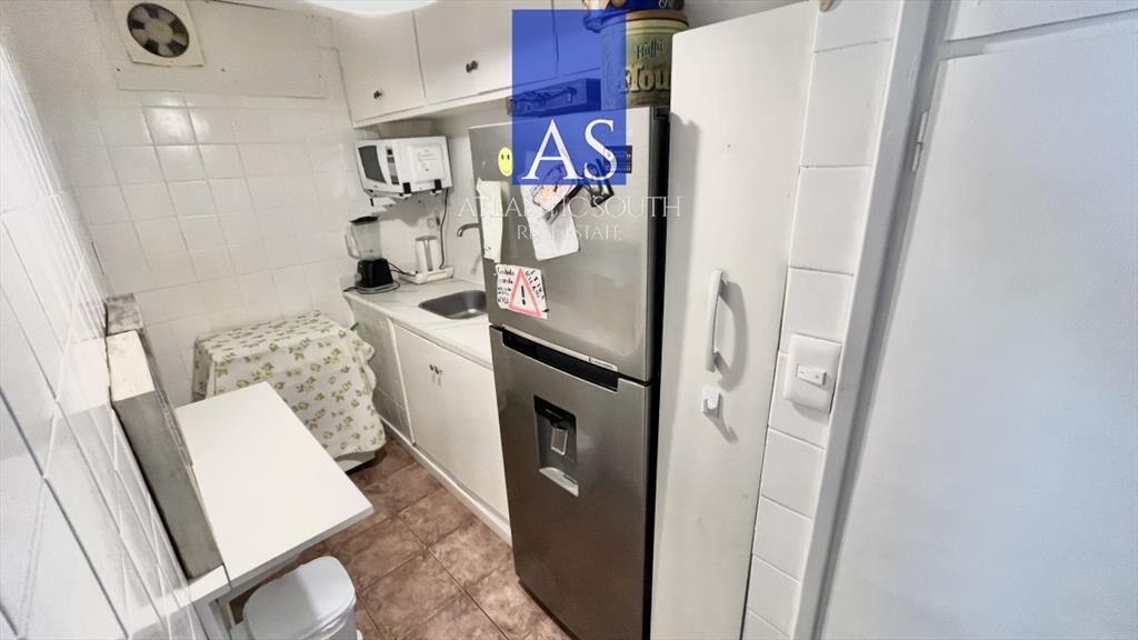 Apartamento de 1 dormitorio con terraza y cochera