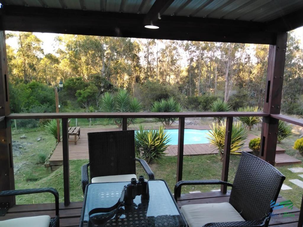 Muy linda chacra con casa, arbolada y bien