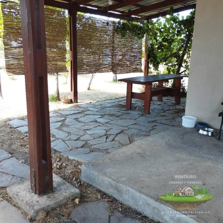 Venta de casa con terrenos en 25 de Agosto, Florida